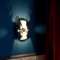 Sconce in Paris pied-à-terre by The House Special Studio.