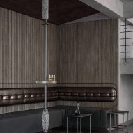 Bar seating in a Bengaluru apartment by Multitude of Sins
