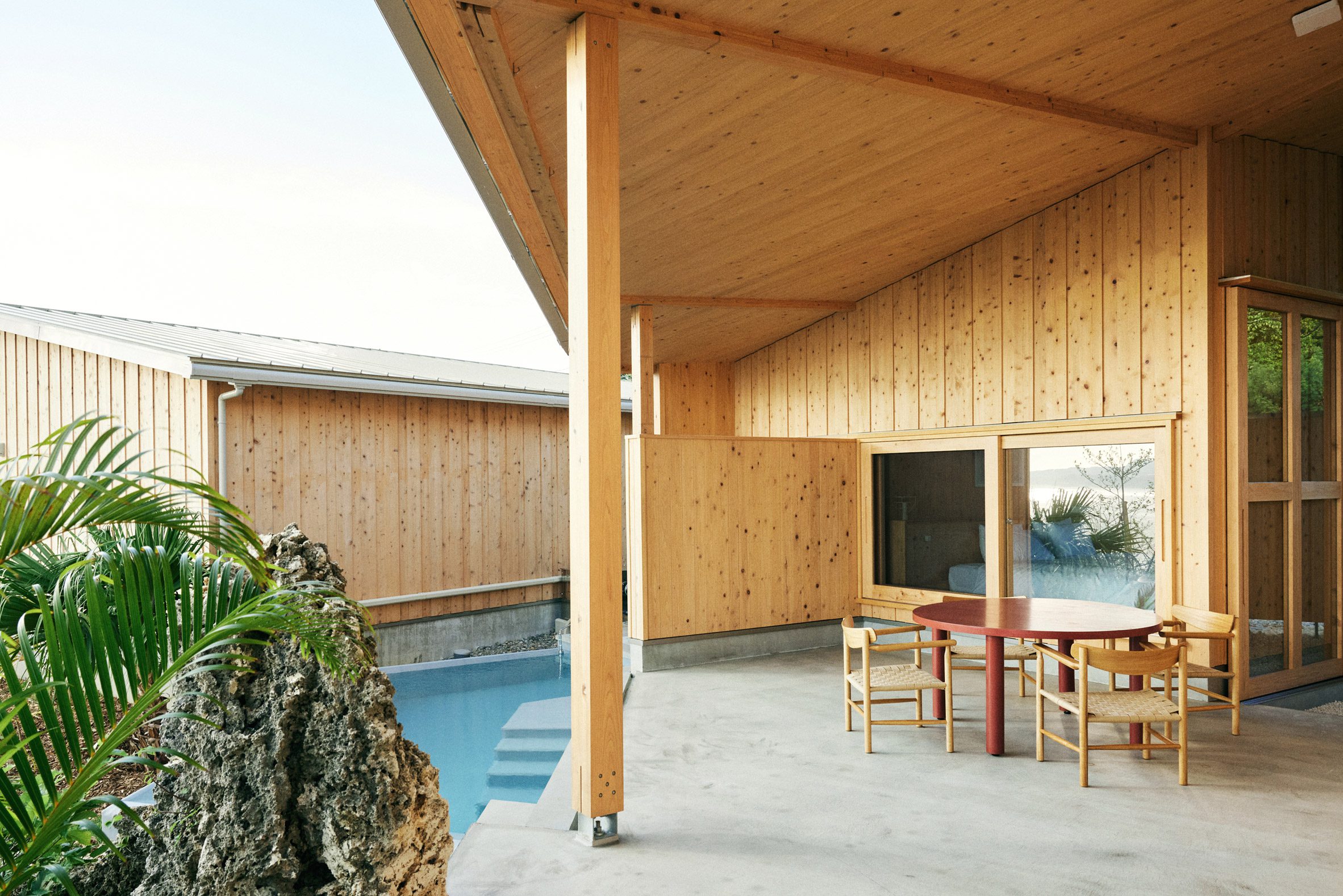 Courtyard of Japanese guesthouses by Schemata Architects