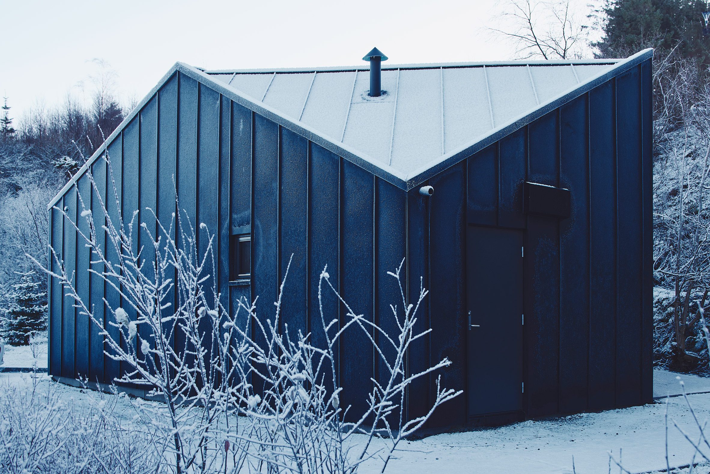 Exterior view of wooden unit at Karmøy Pilot Homes