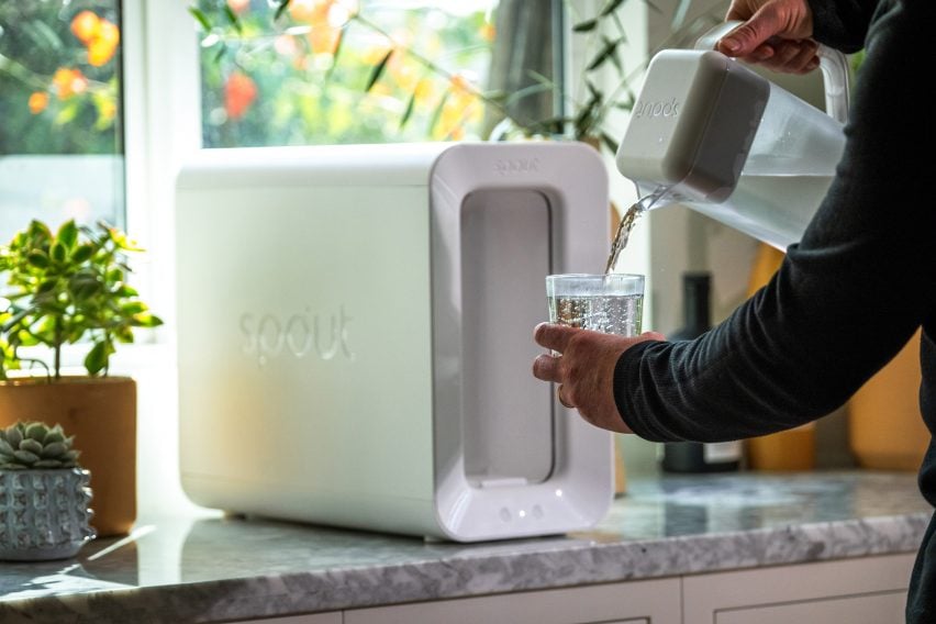 Person taking water out of Spout