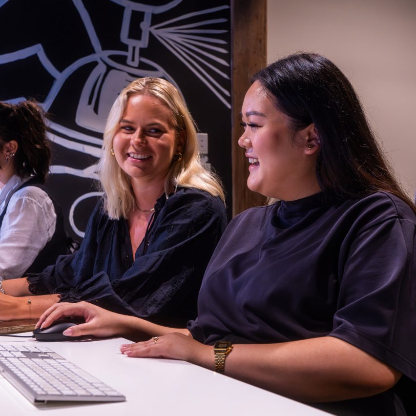 a photograph of students working together