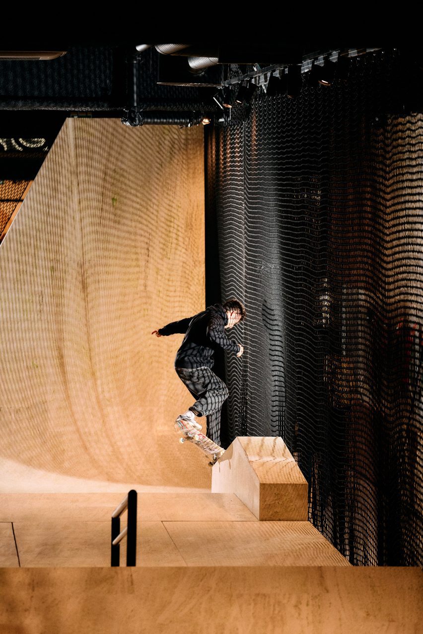 Skateboarding ramp in Vans store