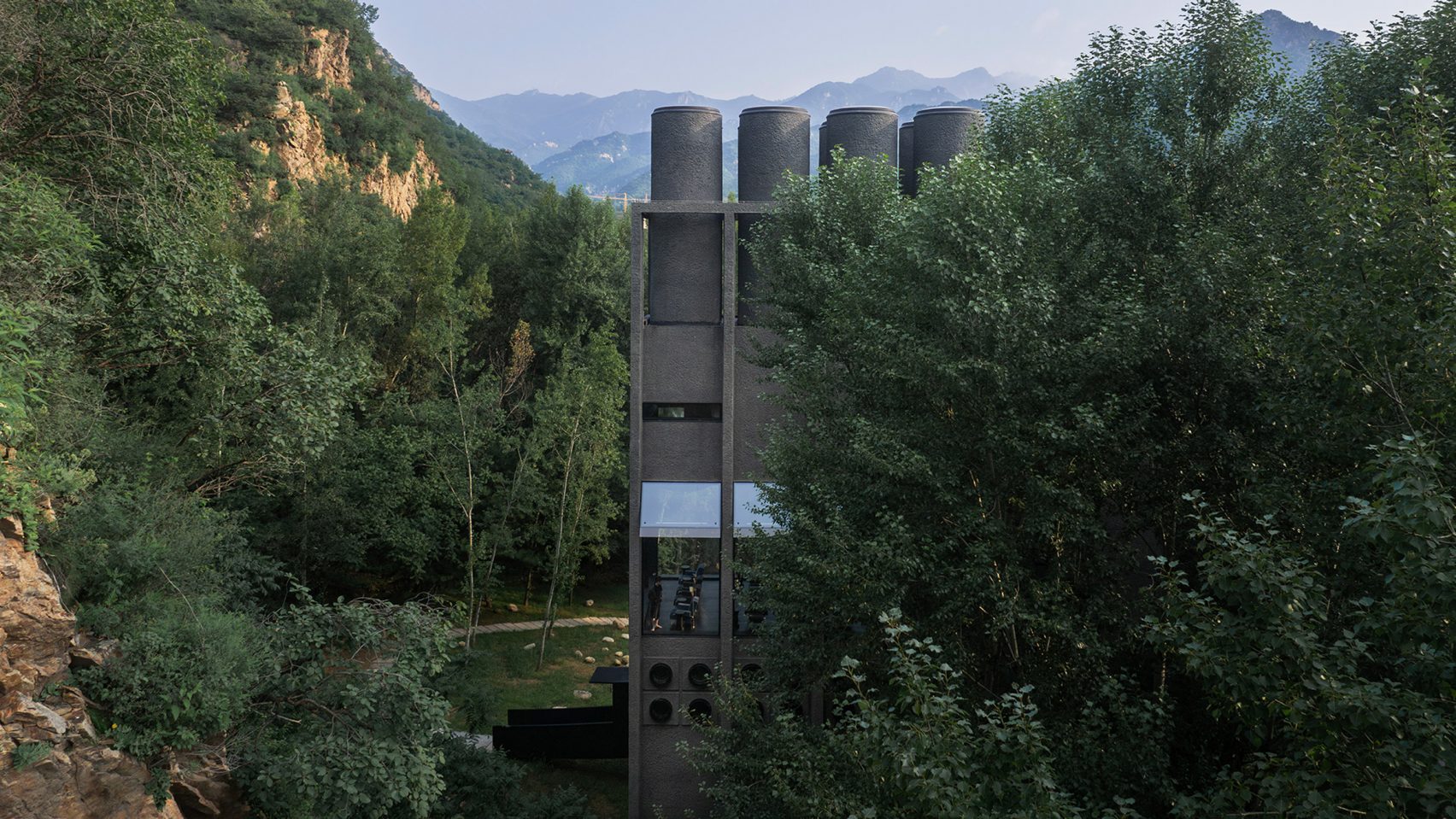 Concrete spa surrounded by forest in China