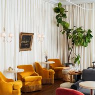 Colourful seating at Le Lounge hotel lobby and bar