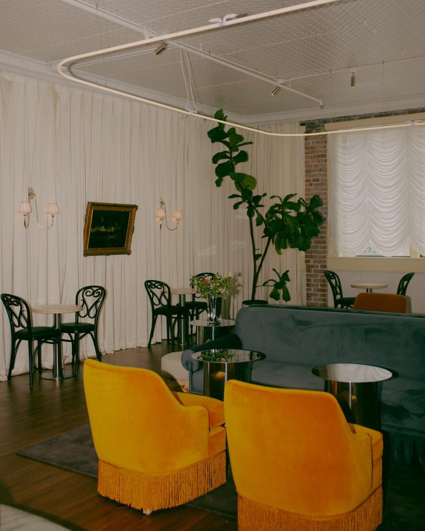 Mustard yellow chairs in hotel lounge