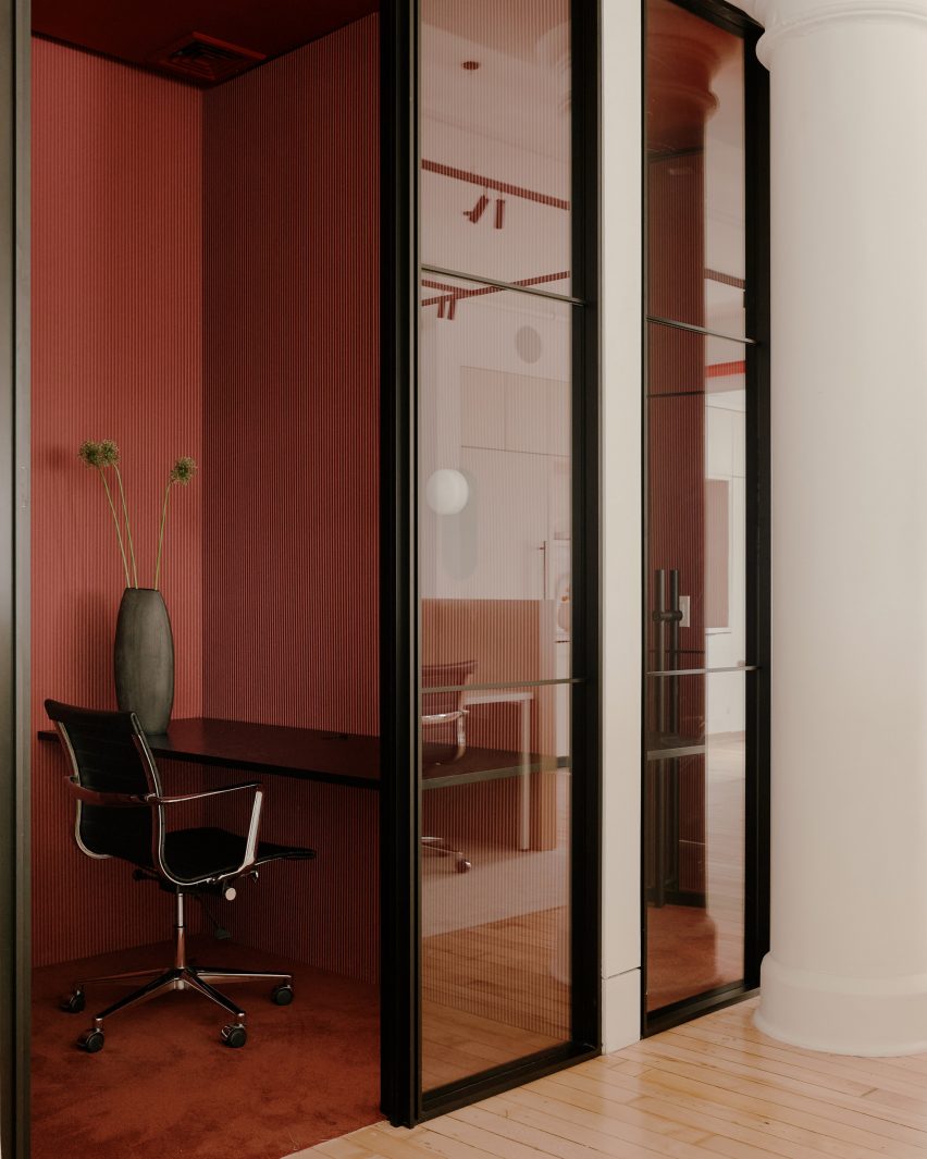 Phone booth with reddish-brown interior