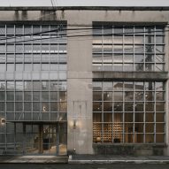 Concrete building with gridded glass windows Tokyo