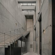 Large concrete entrance atrium with skylights