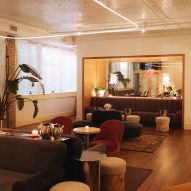 Dimly lit seating area in Le Lounge bar