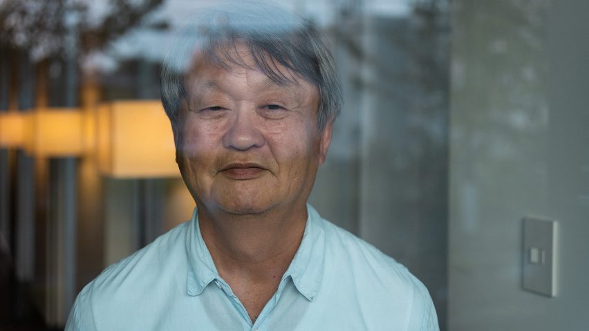 photograph of a man through a window