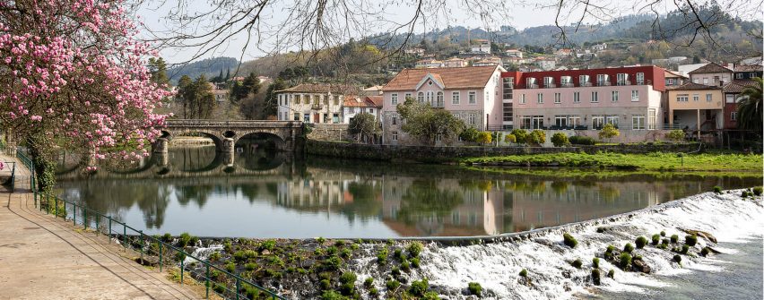 View of a river with buildings on riverbank