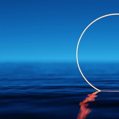 Ring of light partially submerged in water