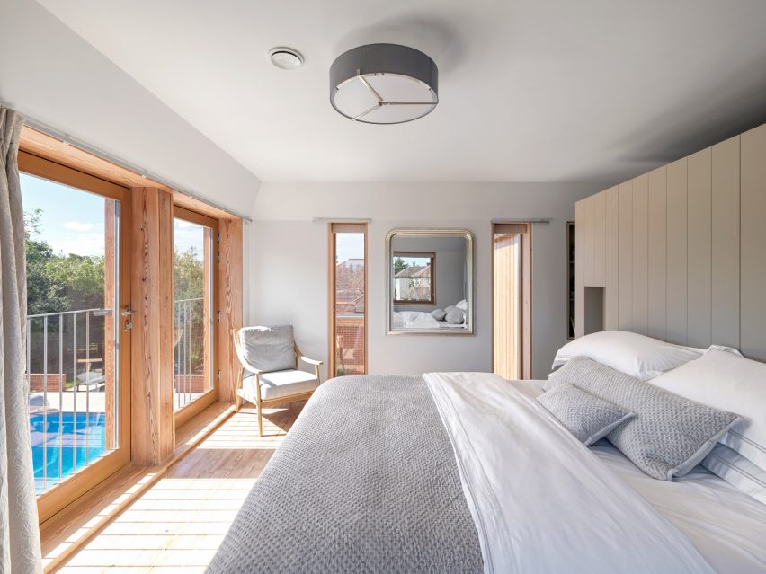 Bedroom interior within Eight Gables by Threefold Architects