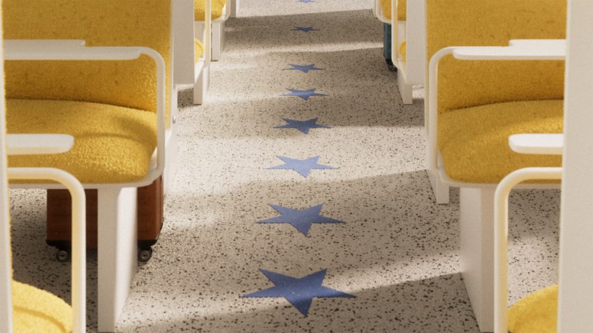 Rendering showing the floor of a Blueprint high-speed rail carriage marked with blue stars next to plush yellow seating