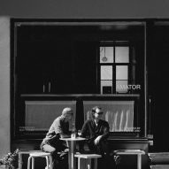 Black and white photograph of Amator's owner, Mati and the designer Adam Wiercinski.