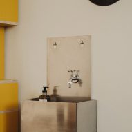 Photograph of a handcrafted steel basin in the bathroom.
