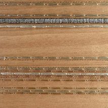 wood block with metal thread design