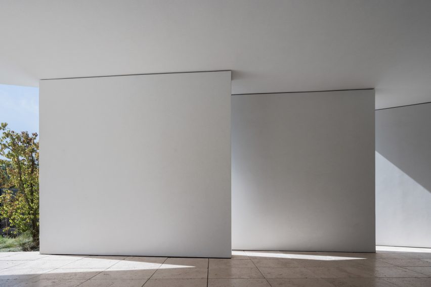 Gill-shaped, concrete blocks let light into the house