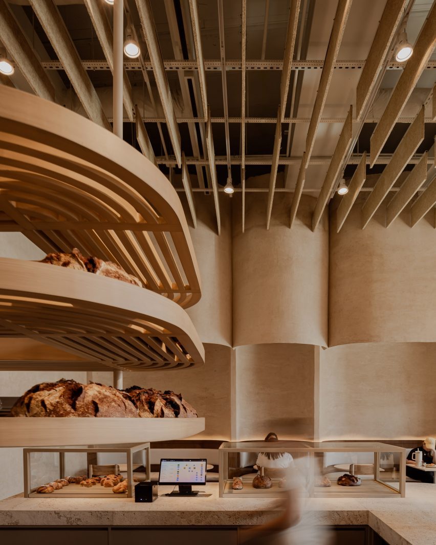 Floating shelves for cooling bread loaves suspended from the ceiling