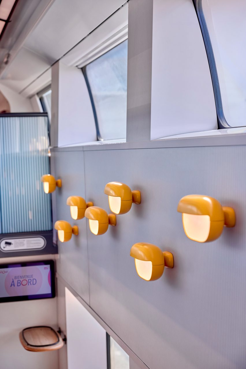 Yellow lights in high-speed train by Nendo and Arep