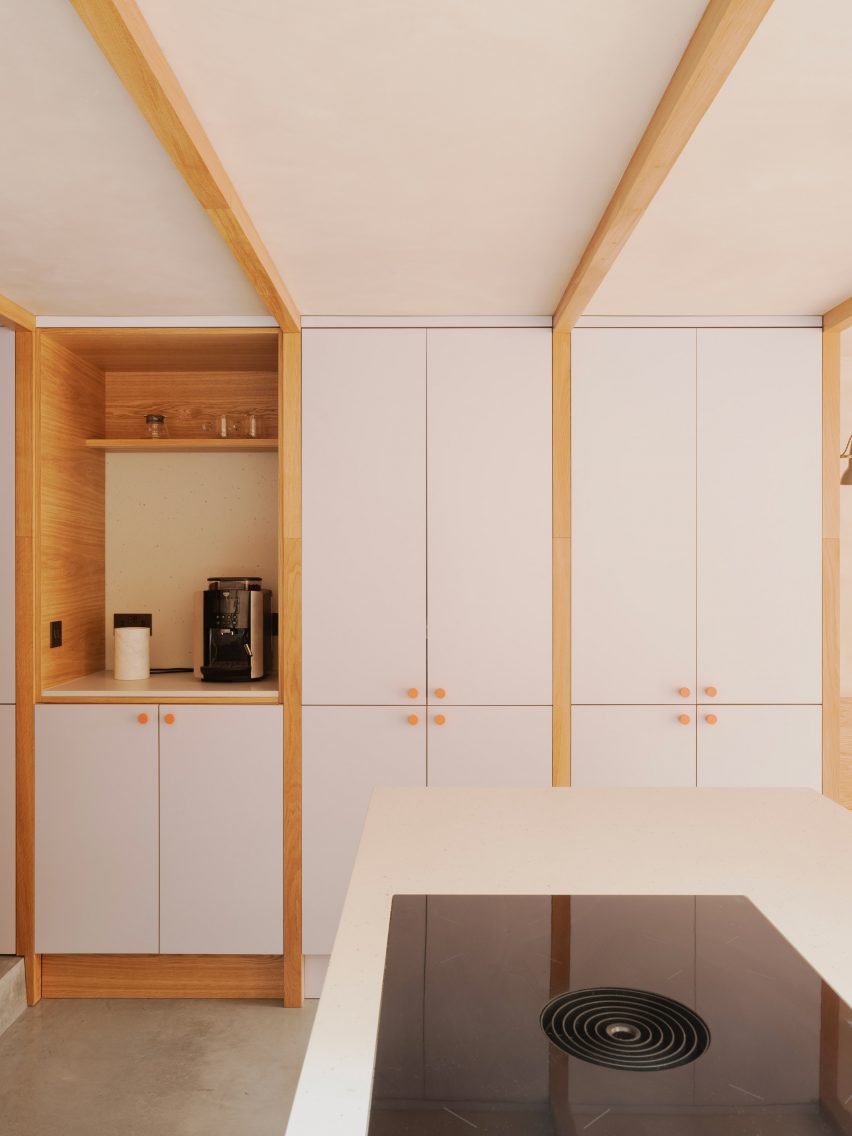Kitchen within Clay House by Pensaer