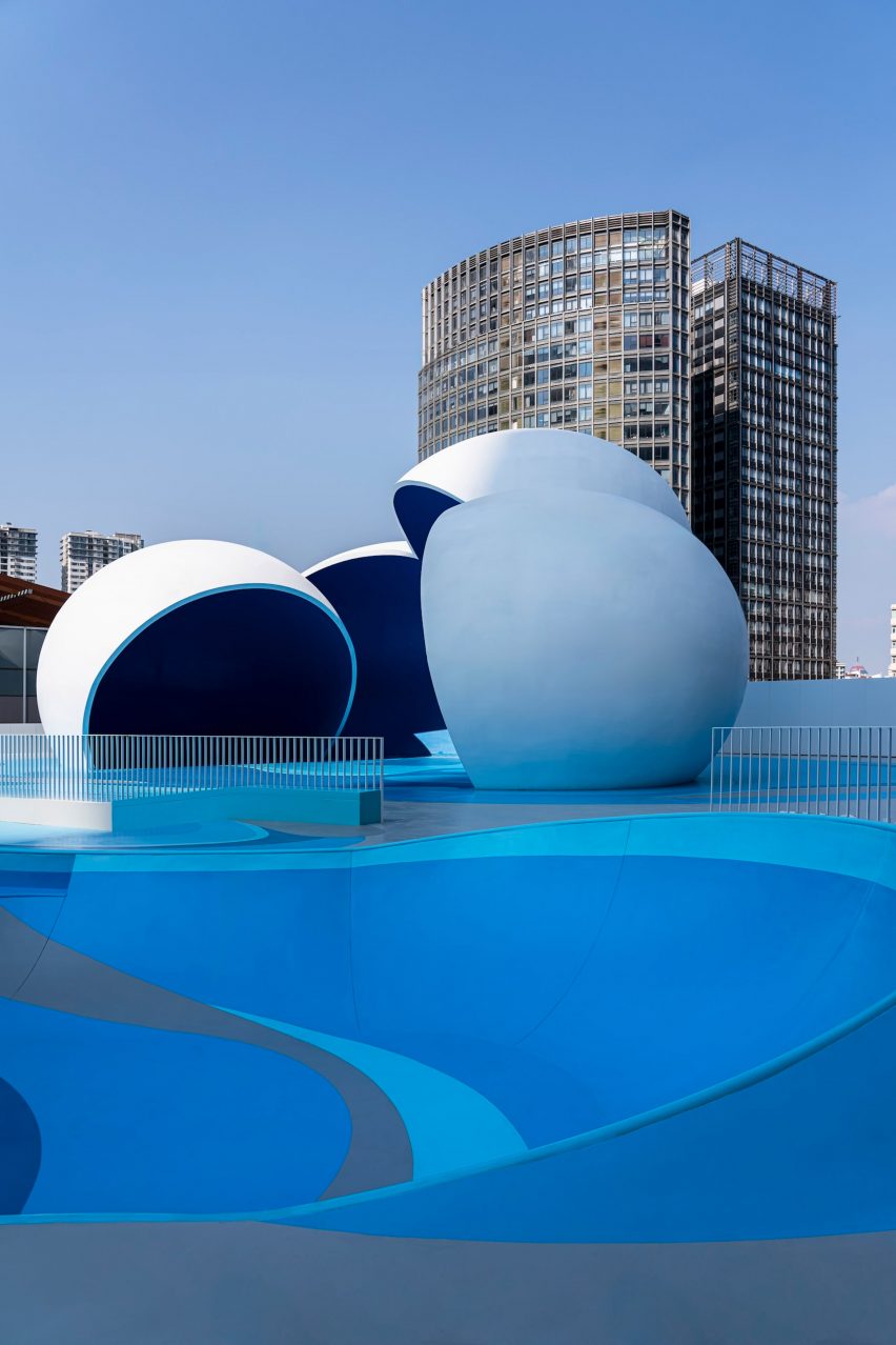 Blue rooftop of a mall for skateboarding