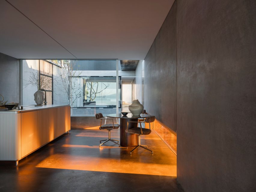View of living spaces within guesthouse by Room11