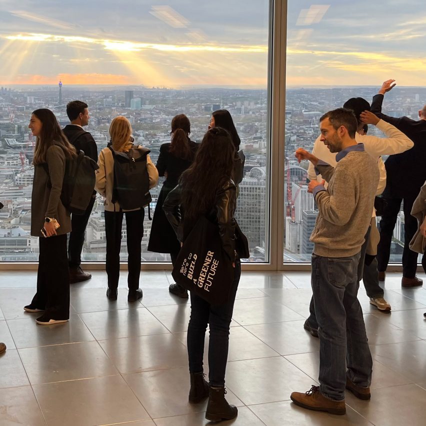 People looking out to cityscape