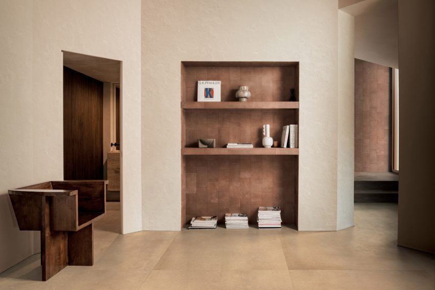 Photo of room with a shelving unit with tiles by Florim
