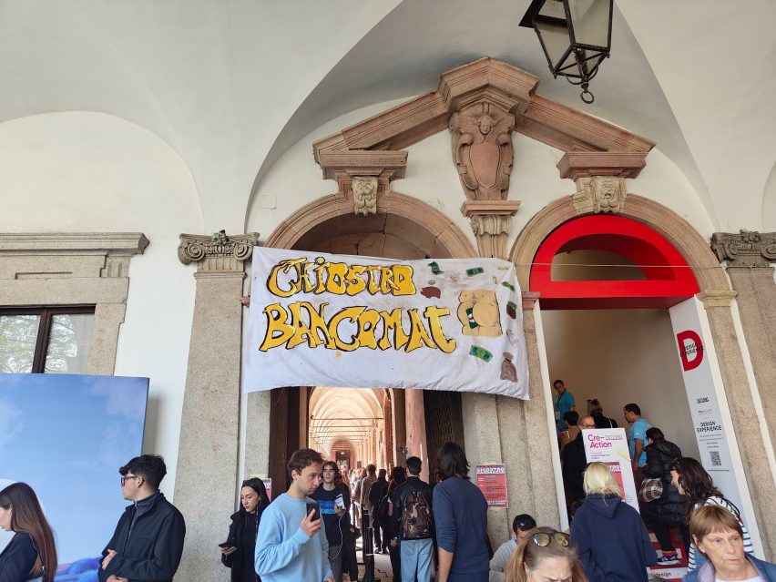Protest banner outside The Amazing Place installation