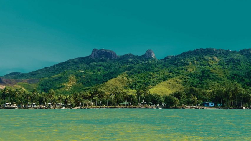 a photograph of a green costal landscape