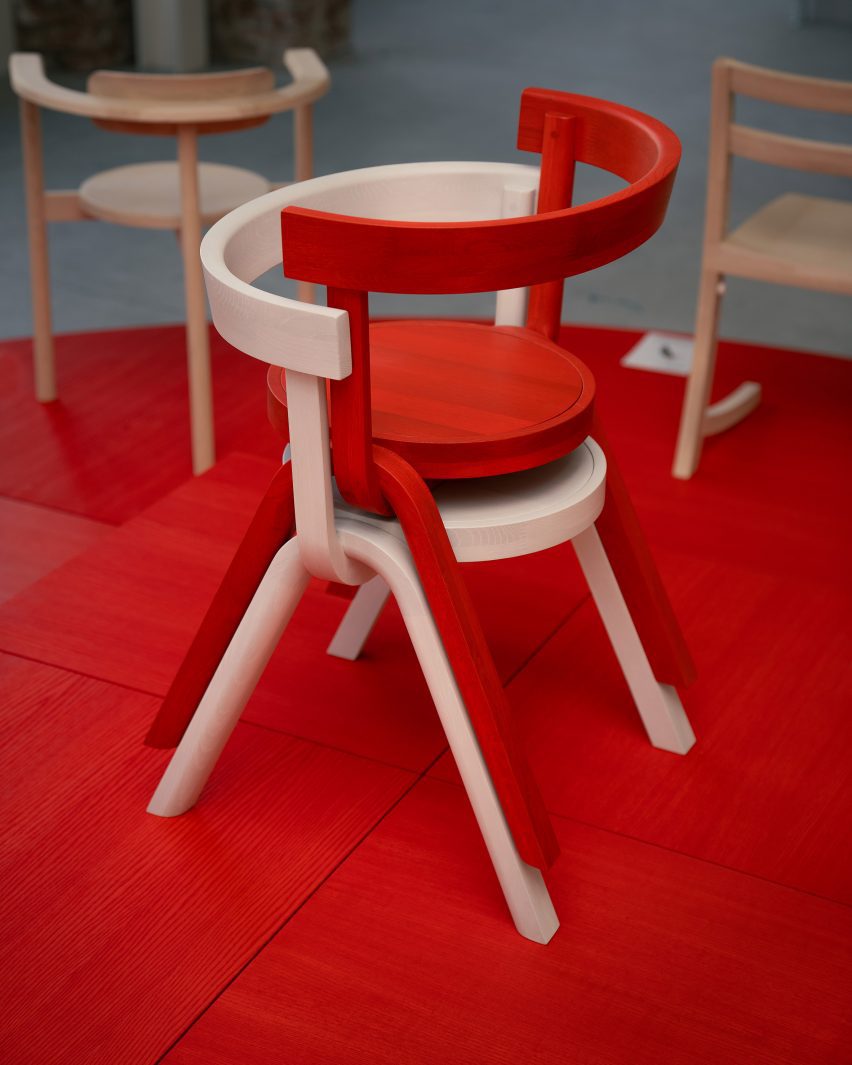 Red and white chairs stacked 
