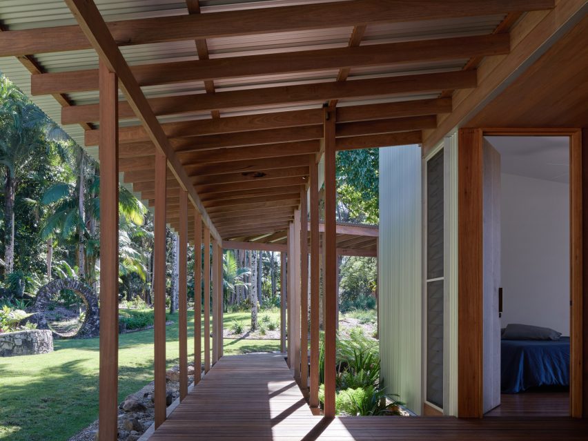 Sheltered walkway within Australian home by DFJ Architects