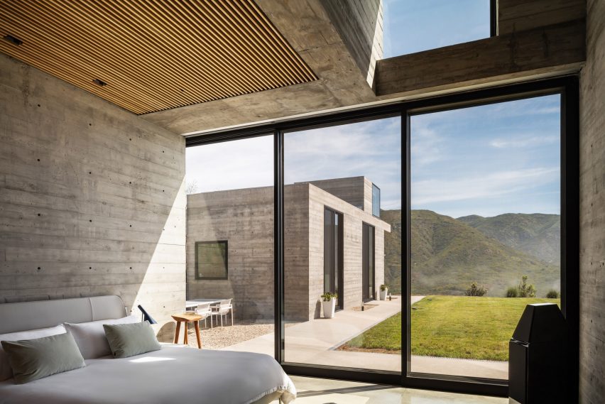 Board-marked concrete home by LOHA