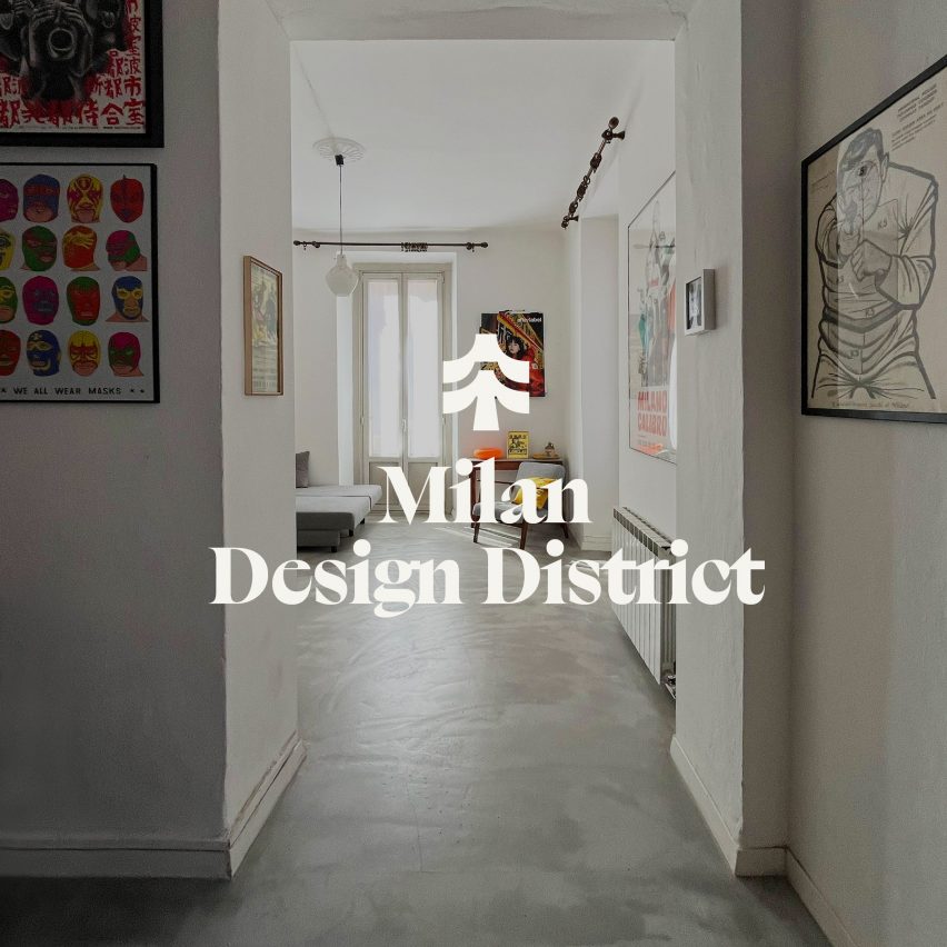 a photograph of an apartment with a grey concrete floor and white walls. Over the photograph is white text which reads 'milan design district'