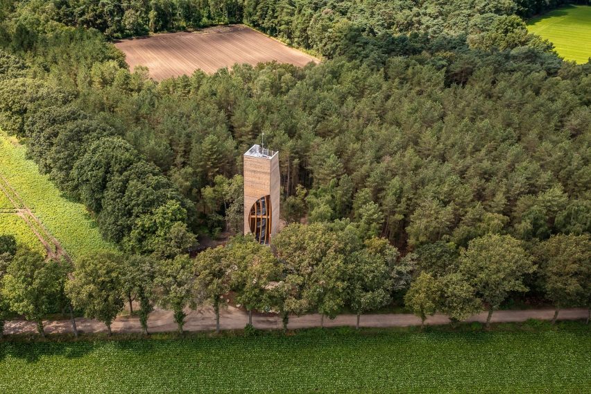 Wooden lookout surrounded by forest NEXT Architects