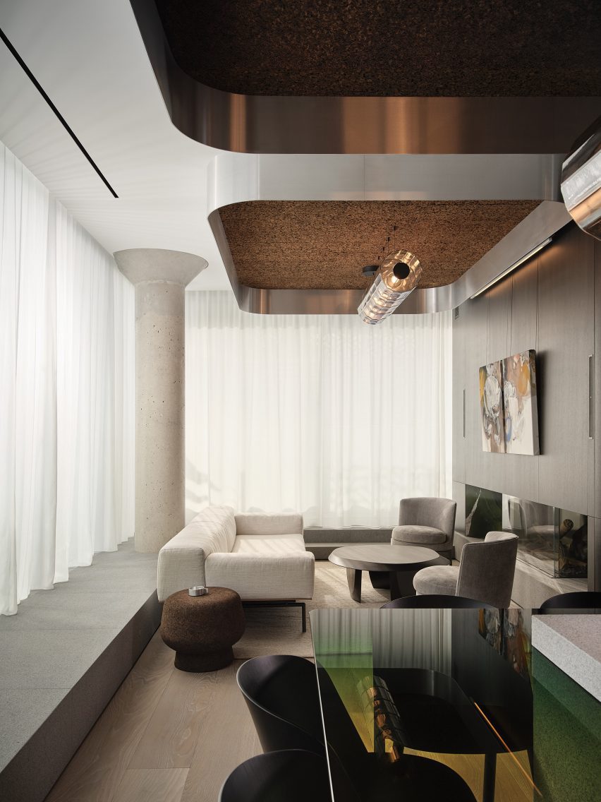 Living room in a penthouse apartment with a granite plinth around the perimeter