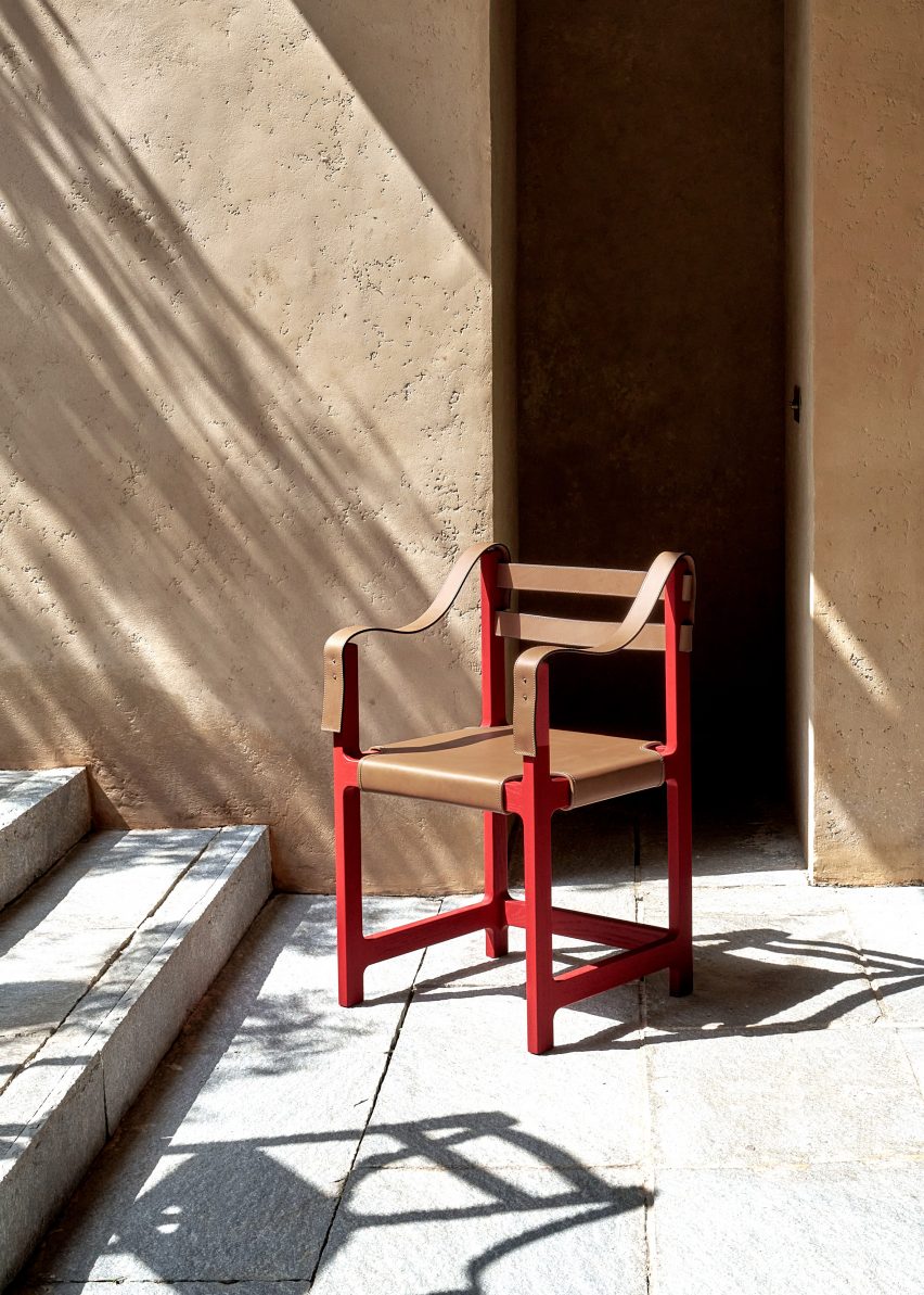 Dining table with red legs by Phantom Hands