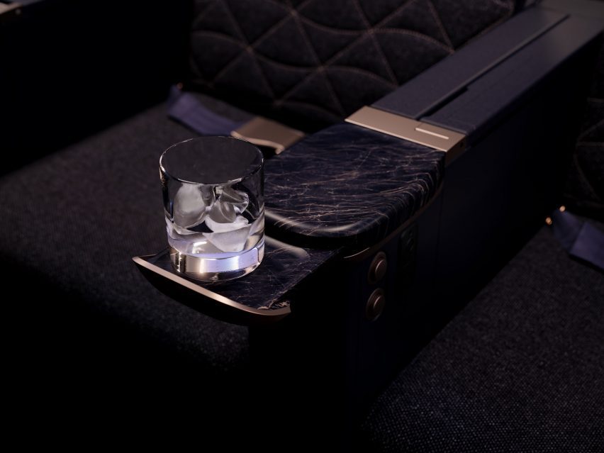 Cup holder in airplane cabin interior by PriestmanGoode