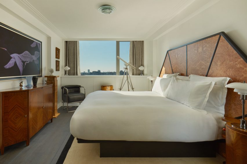 bed with wooden headboard