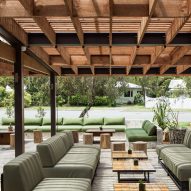 Dining are under wooden pergola facing onto street