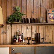 Wood-panelled 1970s-style interior