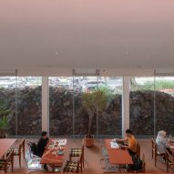 Mounded stones outside glass window