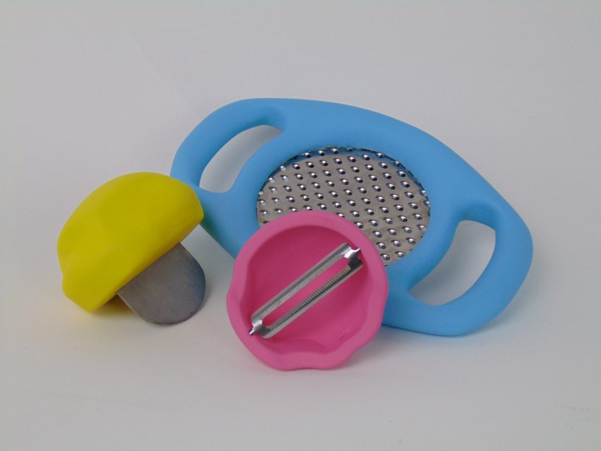 a photograph of a set of utensils in tones of pink, blue and yellow