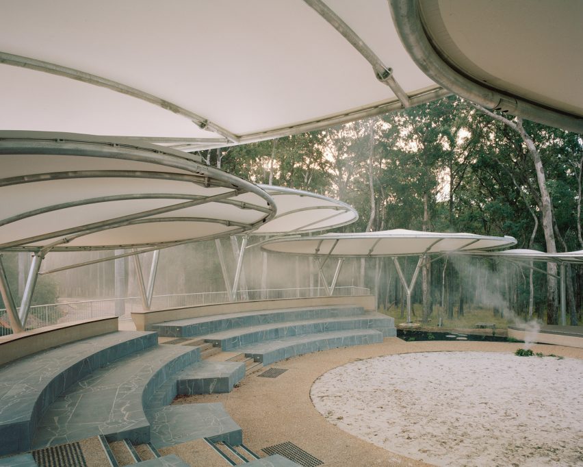 Seating space within community amphitheatre by Equity Office