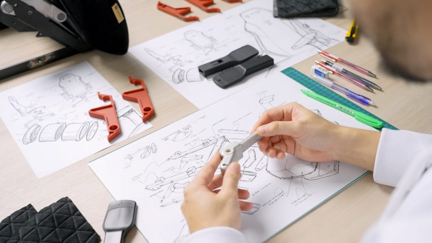 Person studying technical papers
