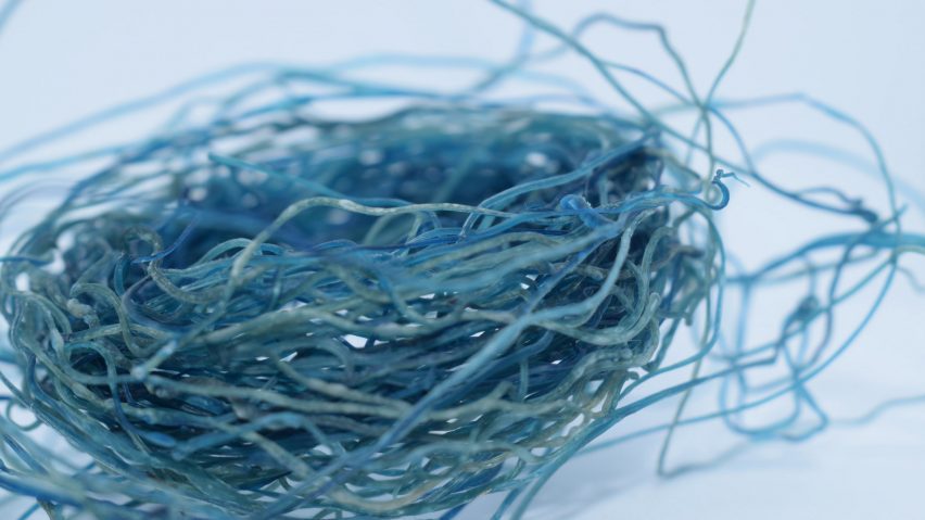 a photograph of a bundle of blue textile