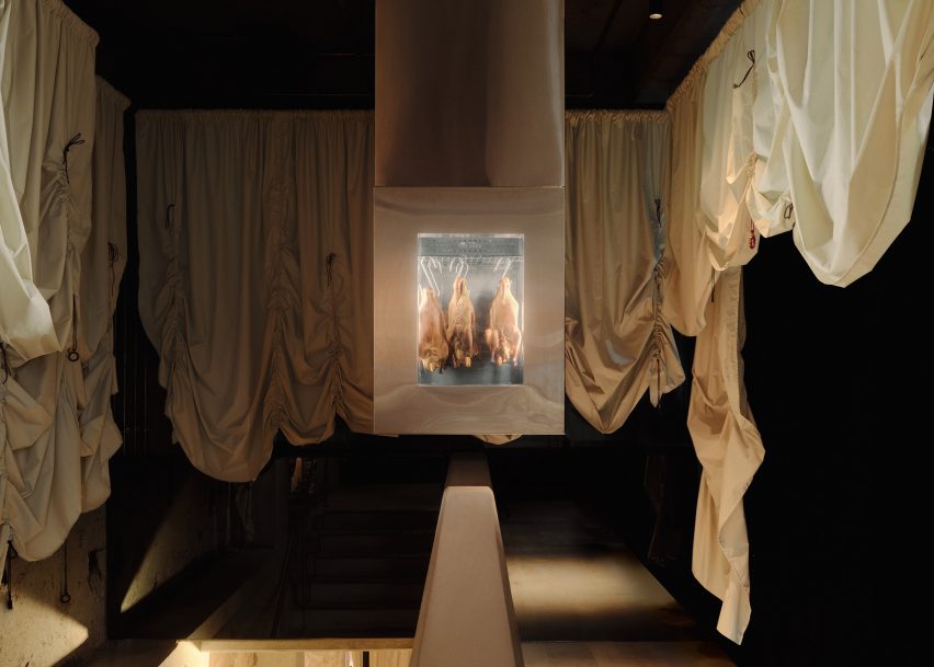 Poultry display among fabric dividers in Central restaurant 