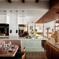 Pistachio green tiled counter and wooden details in Cibaria restaurant